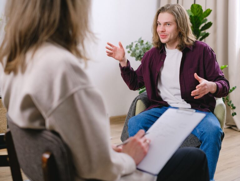 Patient speaking with a therapist during a professional counseling session